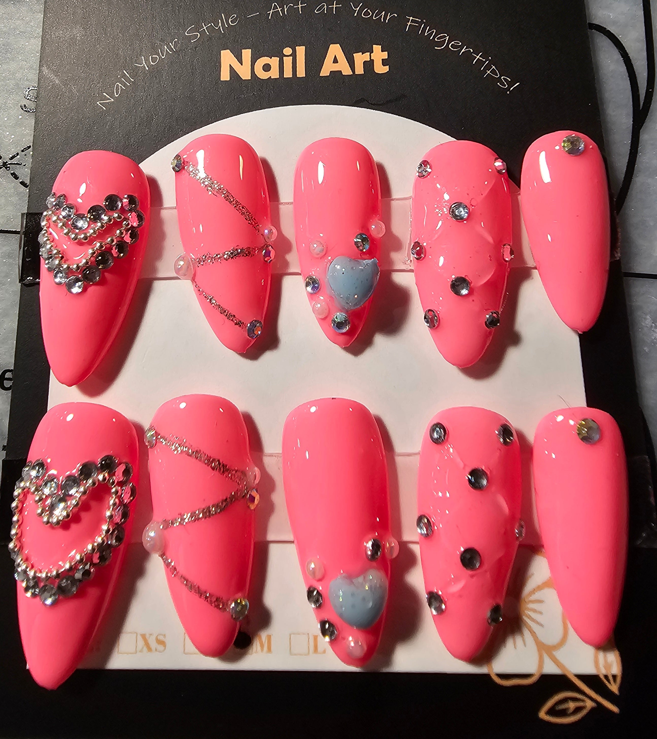 Elegant Pink press on nails accented with rhinestones and hearts
